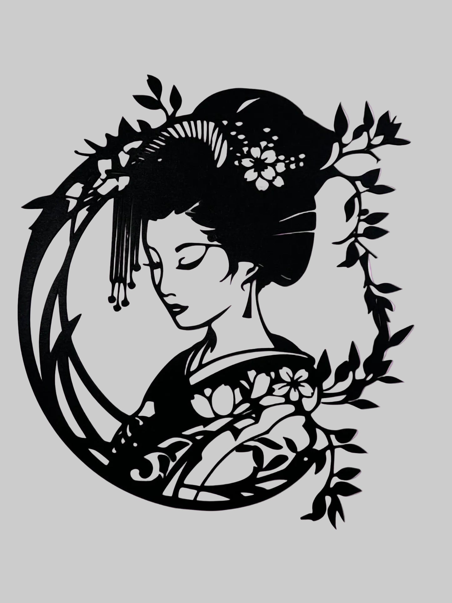 La Geisha tra i fori di ciliegio incisa su Legno