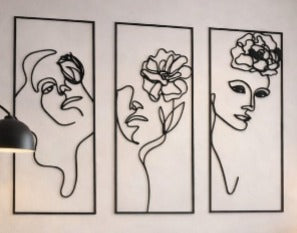 I tre volti femminili  in linea continua