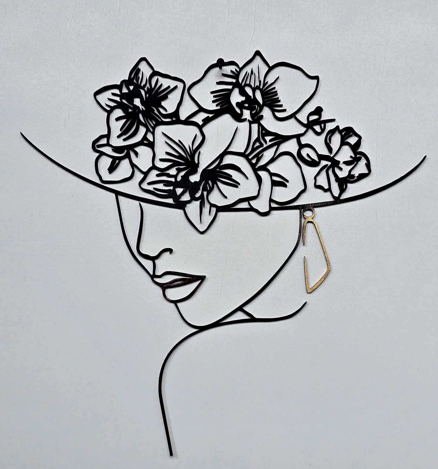Profilo di donna con Cappello di Orchidee